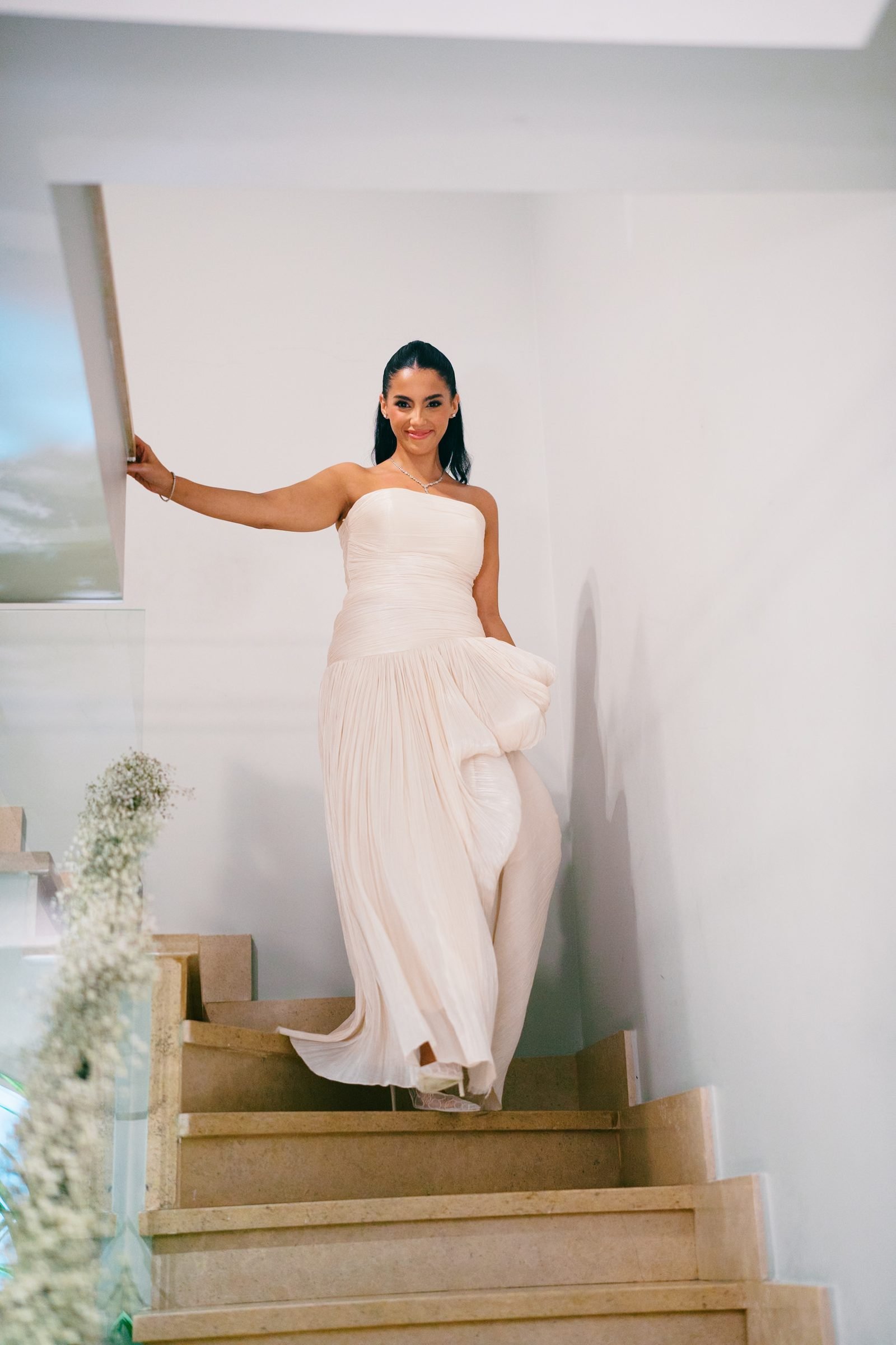 Bride standing on a staircase
