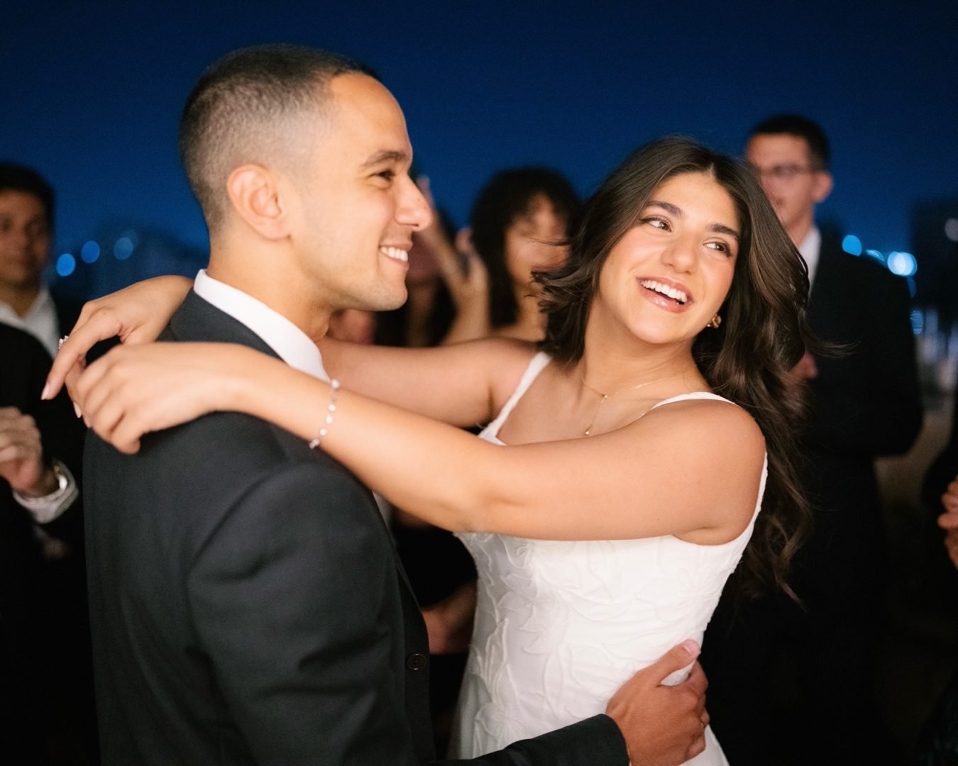 Couple dancing close and laughing